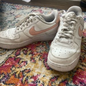 NIKE AIRFORCE 1 with pink swoosh